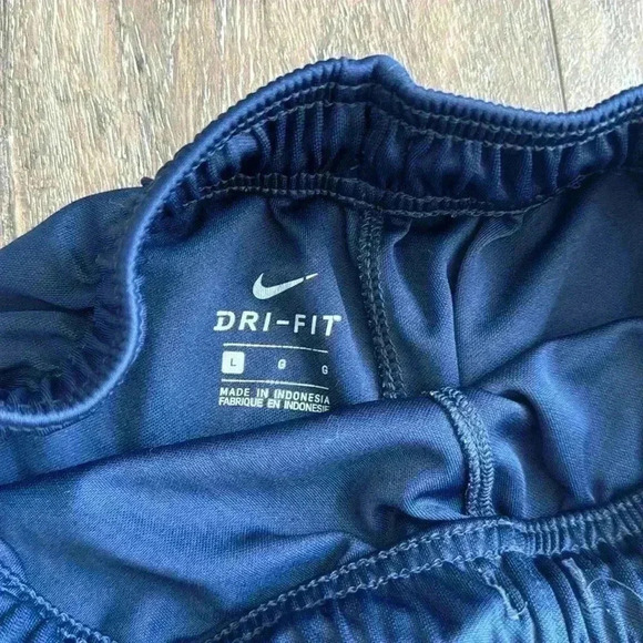 Nike shorts.  Boys size large. Listing is for both pairs.  Both are navy blue. - Picture 3 of 7